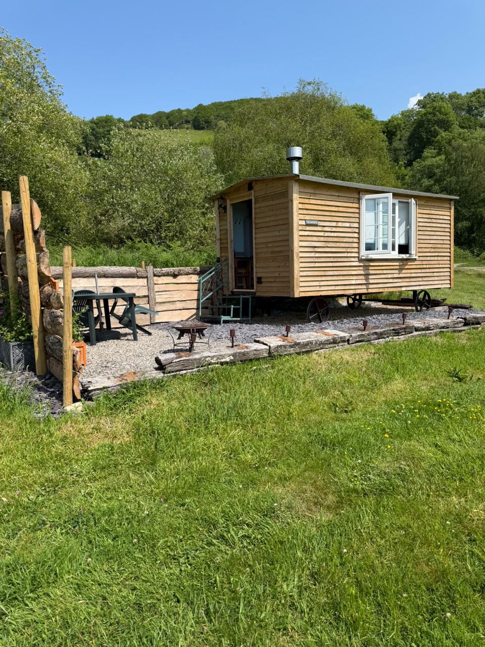 Hut with decking and gravel