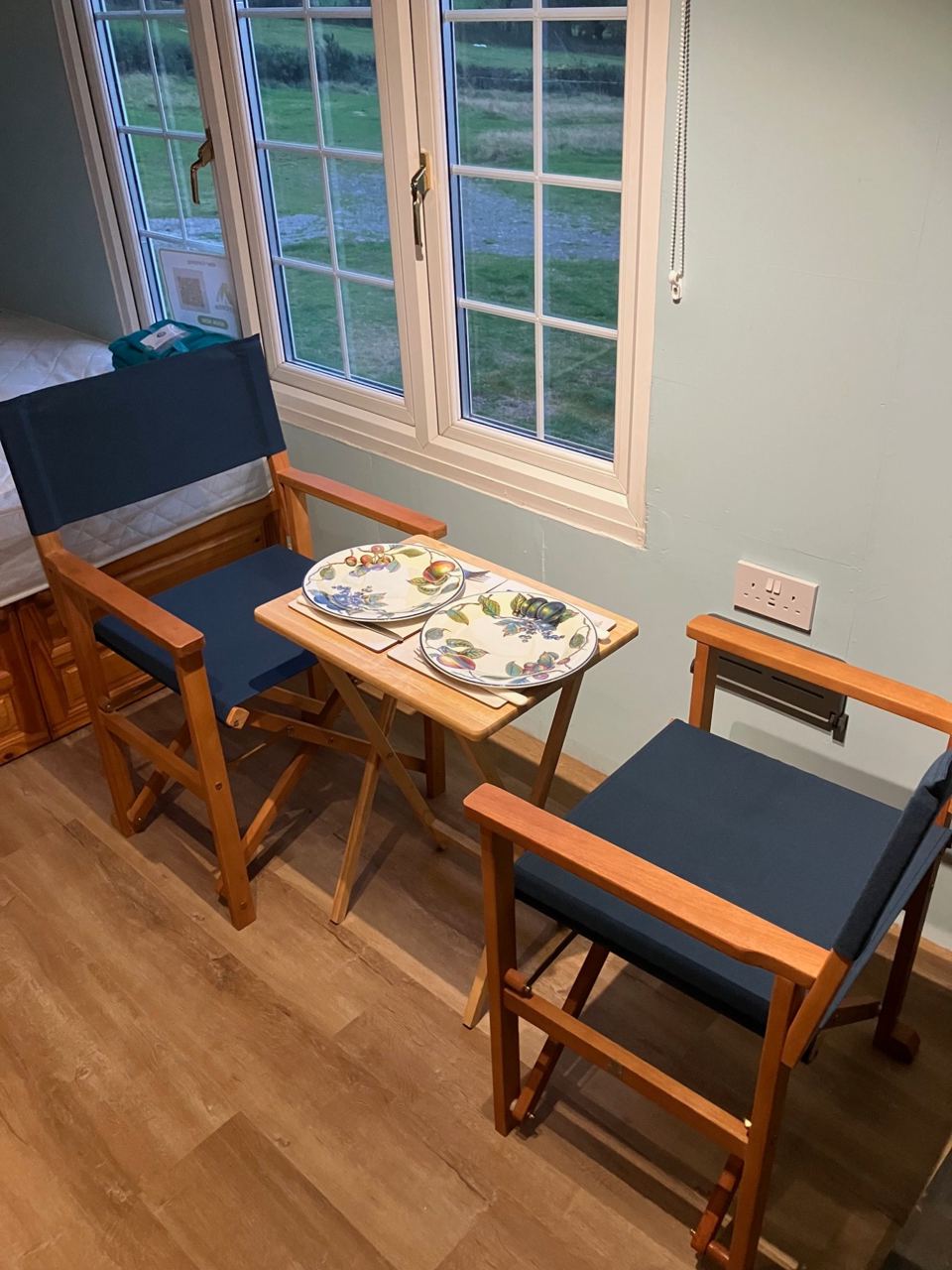 Table and chairs by the window