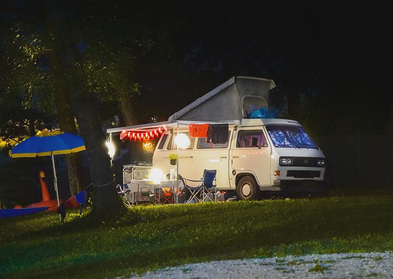 Campervan pitched at night