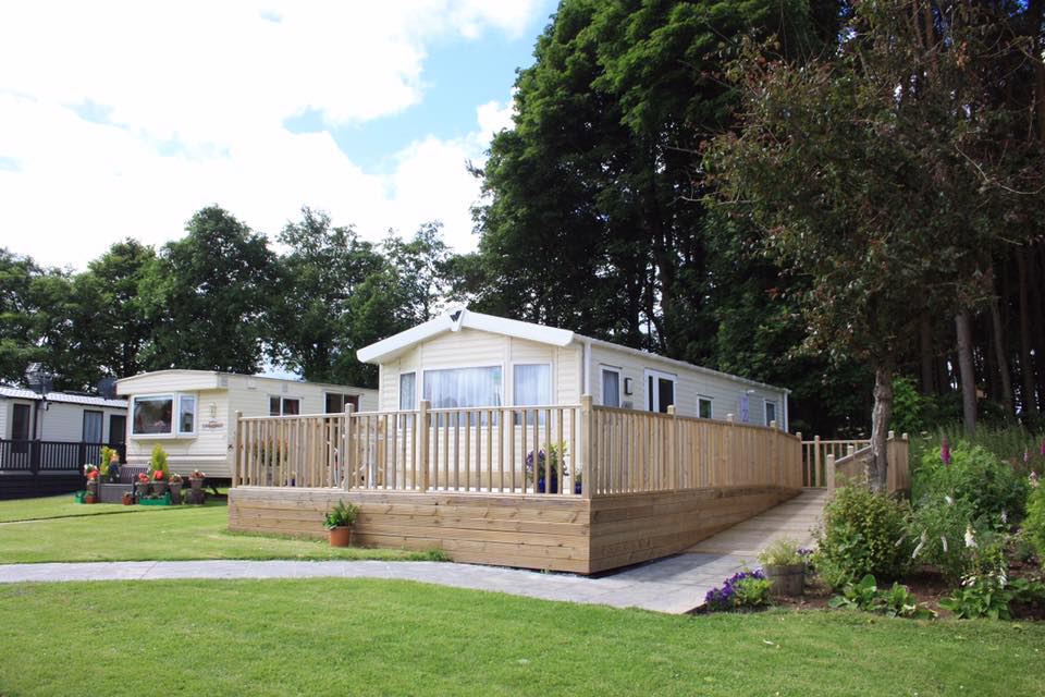 Static caravan with decking