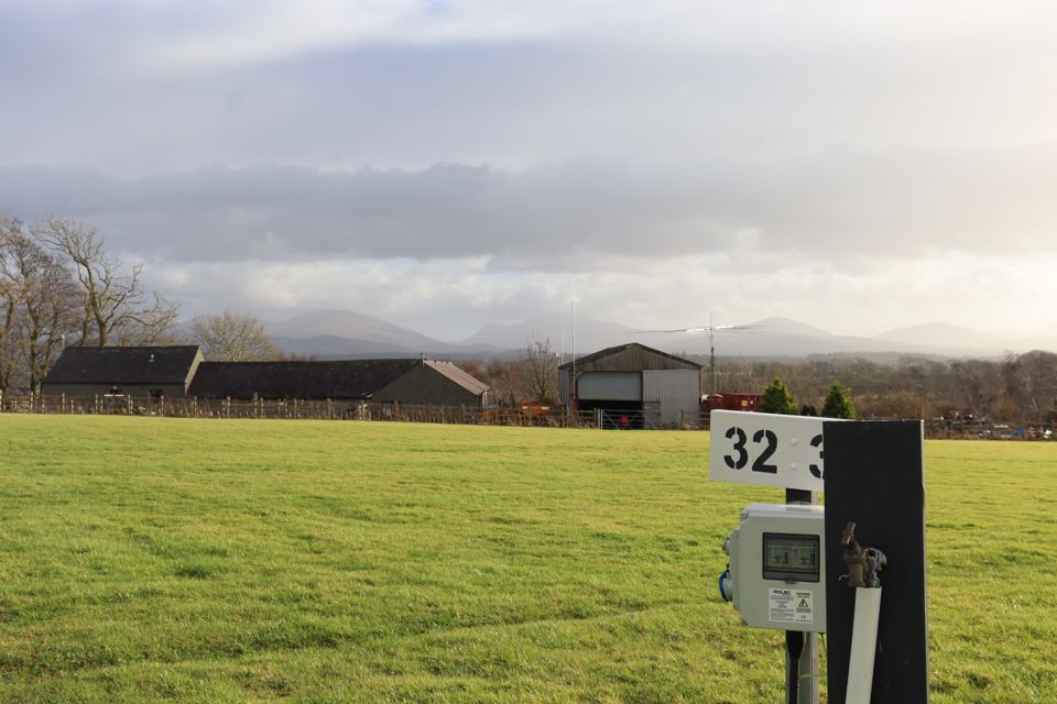 Grass pitch with electric post