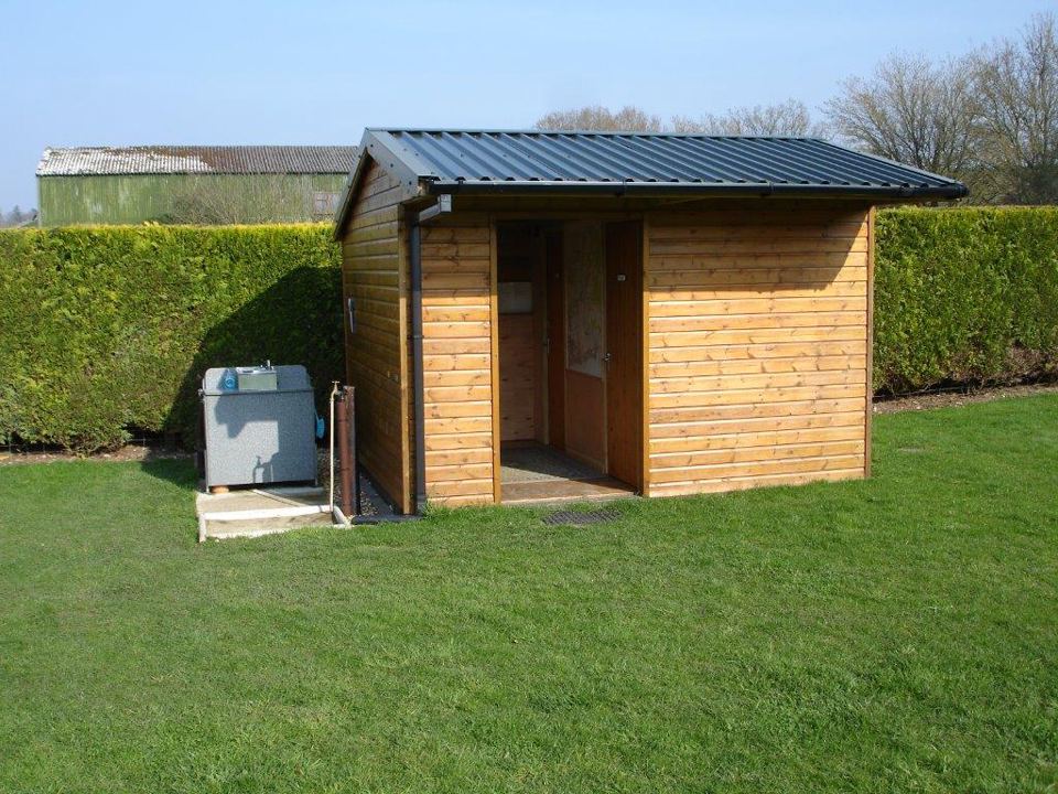 Toilet and shower block