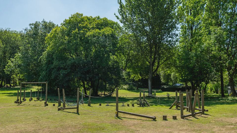 Open grass with trim trail