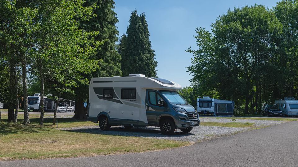 Motorhome on a grass and gravel pitch