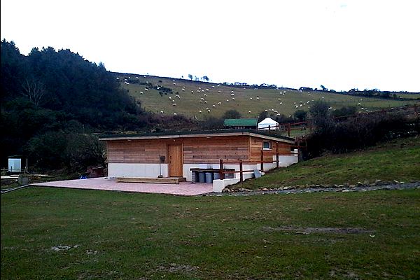 Wooden facilities block above the field