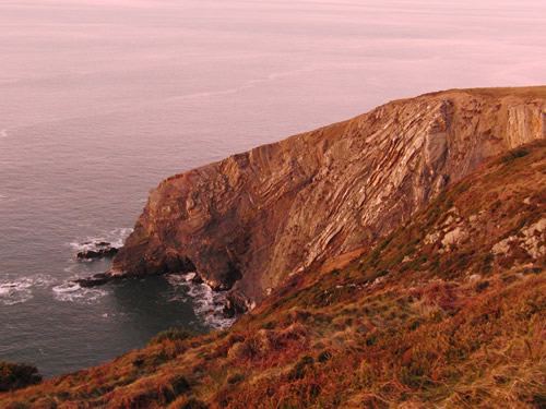 Coastal cliffs at sunset