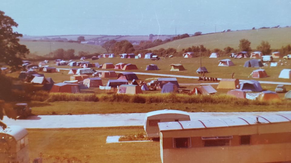 Historic view of caravans on the field