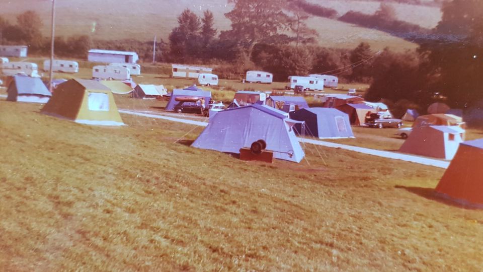 Historic view of tents on the field