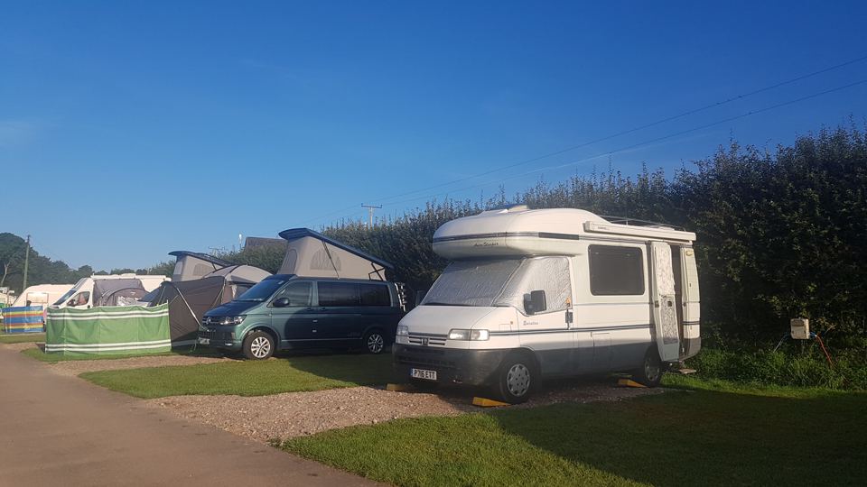 Motorhome pitches by the hedge