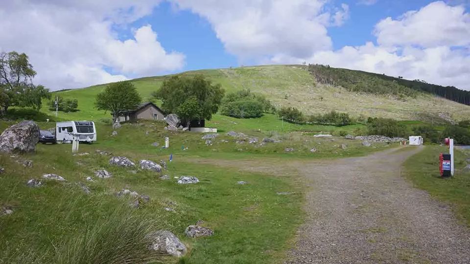 Pitches and track below the hill