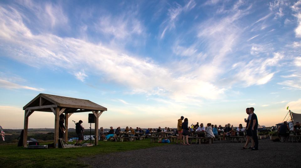 Gazebos under an evening sky