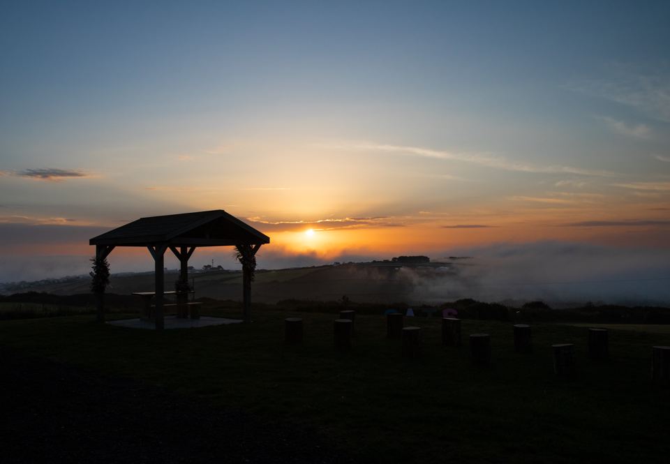 Sunset over the gazebo field