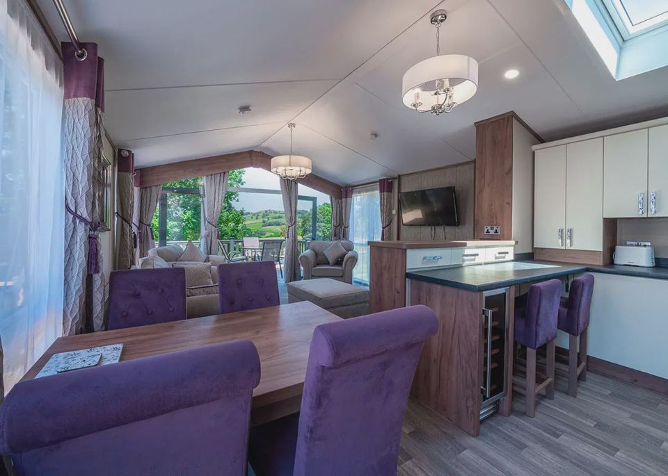 Dining area with purple chairs