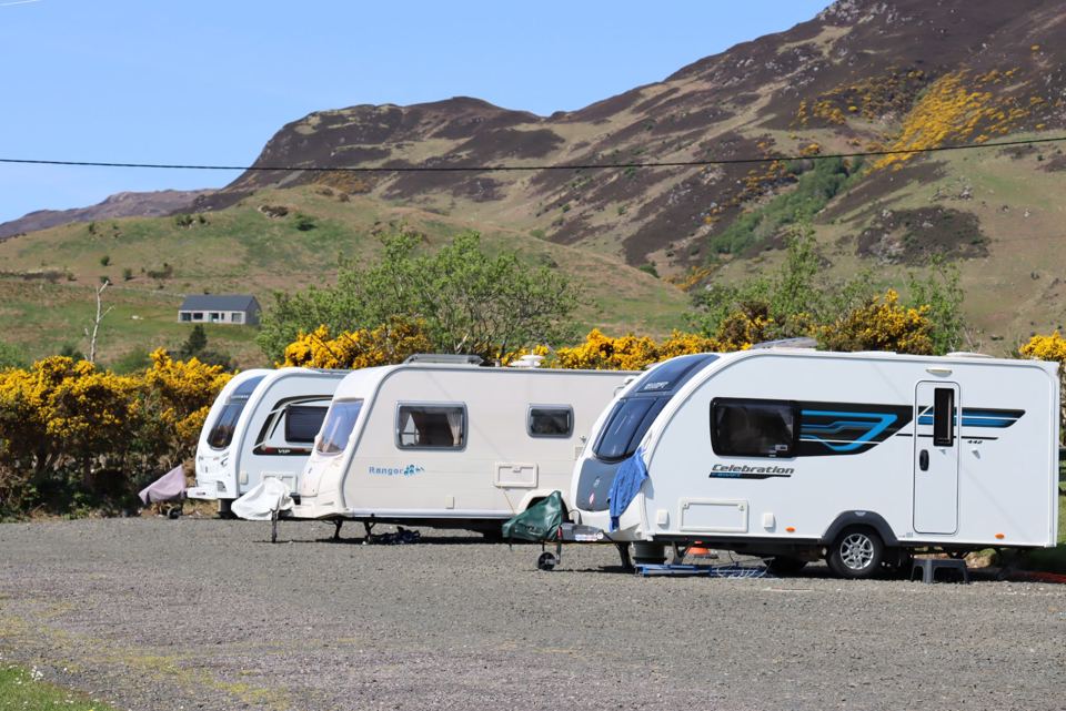 Caravans below the hills
