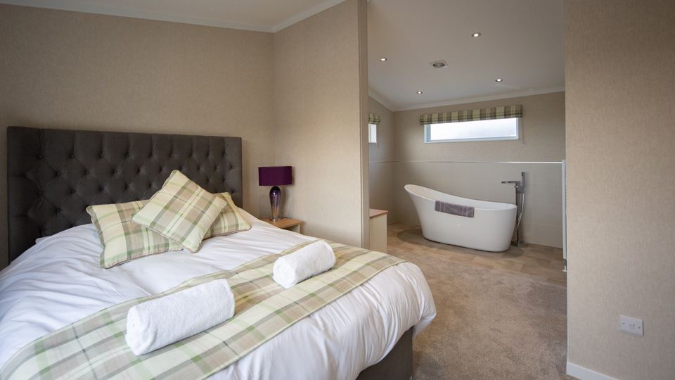 Bedroom with freestanding bath