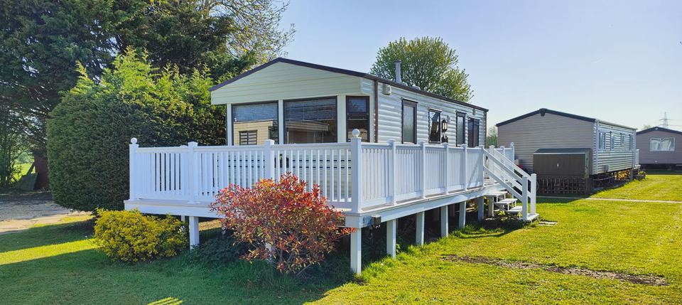 Caravan with white decking