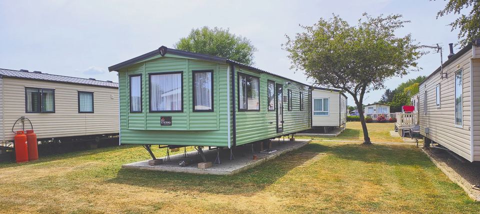 Static caravan on a patio base