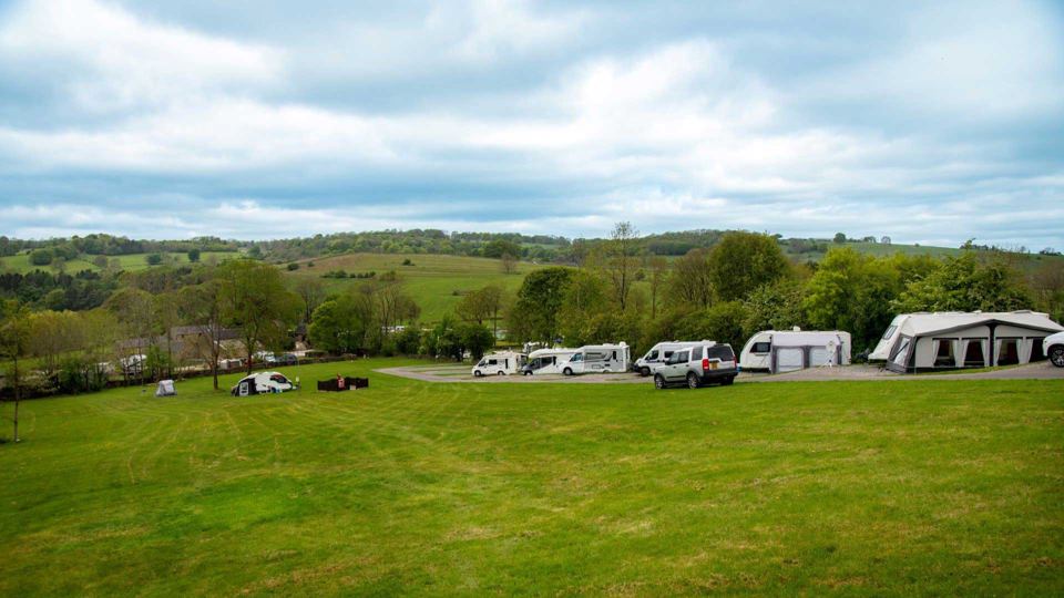 Grass pitches with valley views