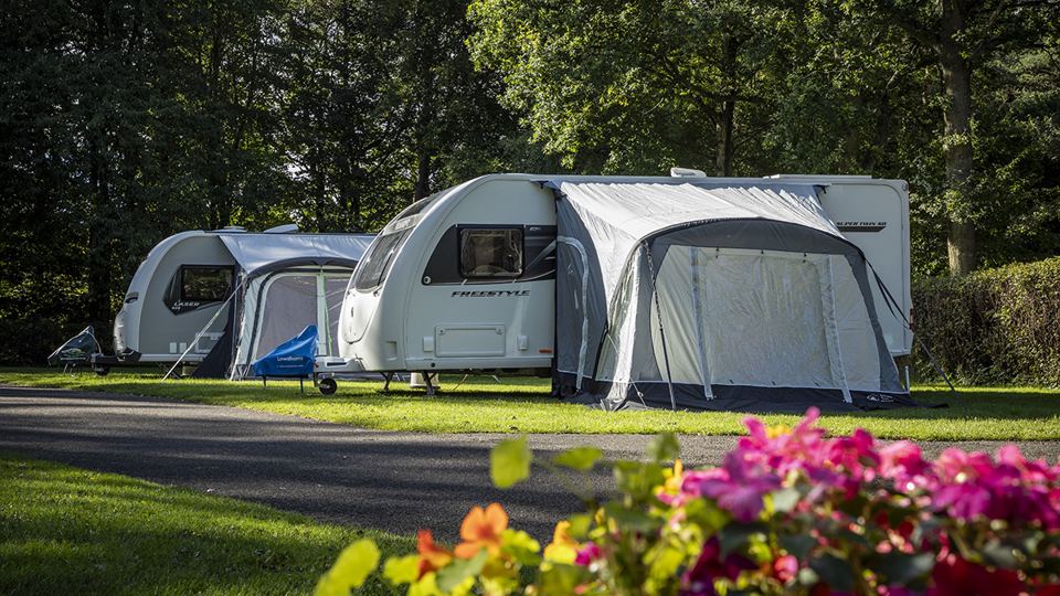 Caravan with awning on hardstanding