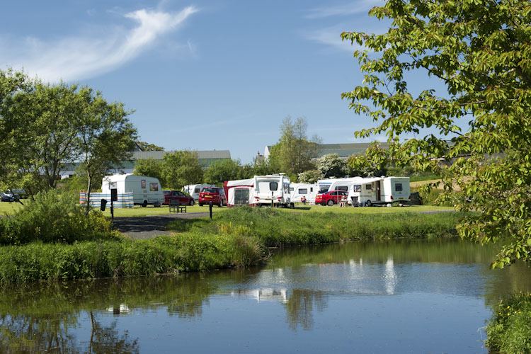 Touring pitches beside the pond