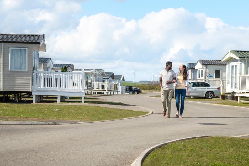 Caravan-lined park road