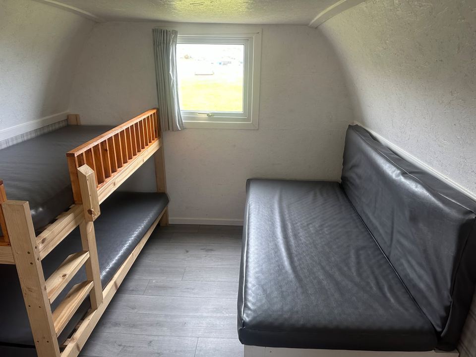 Bunks and seating in a pod