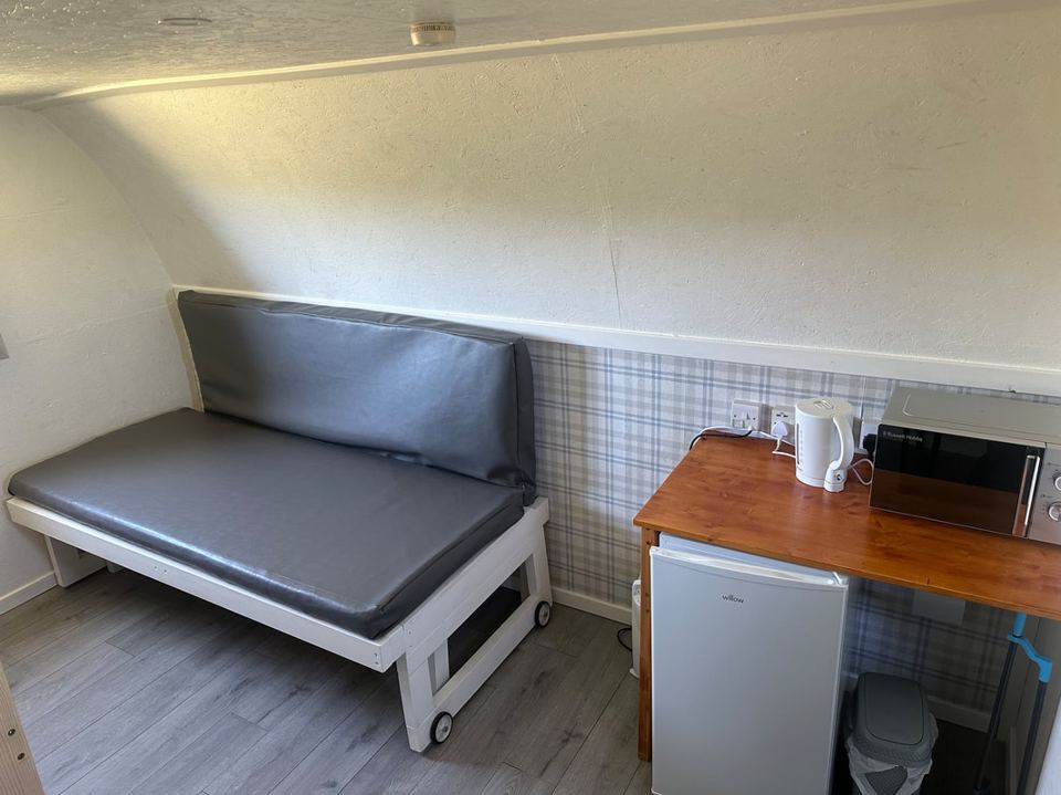 Pod sofa bed and kettle