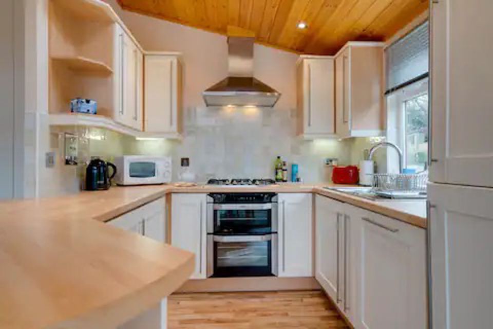 Fitted kitchen with oven