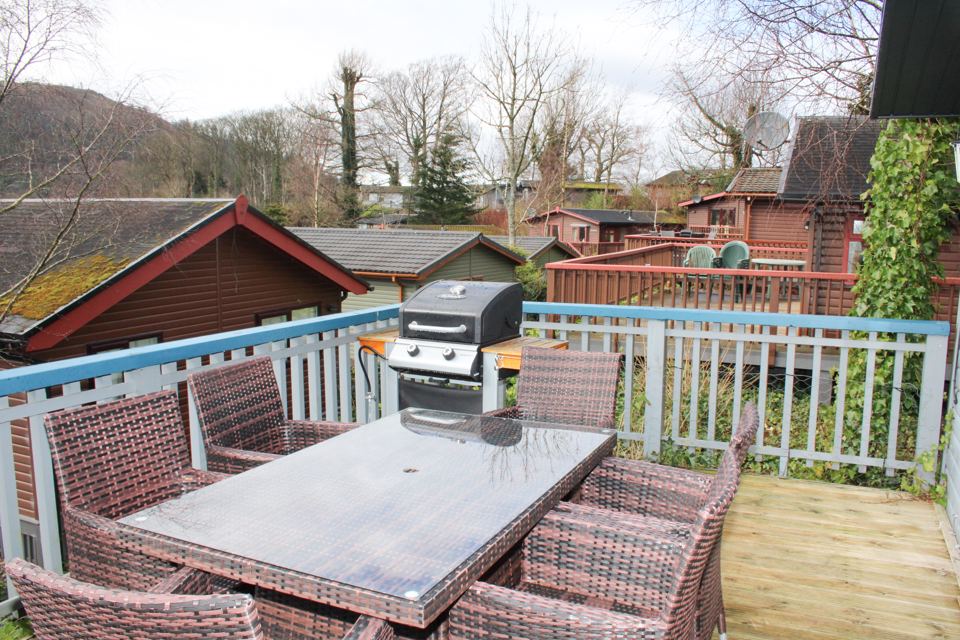 Decking with table and barbecue