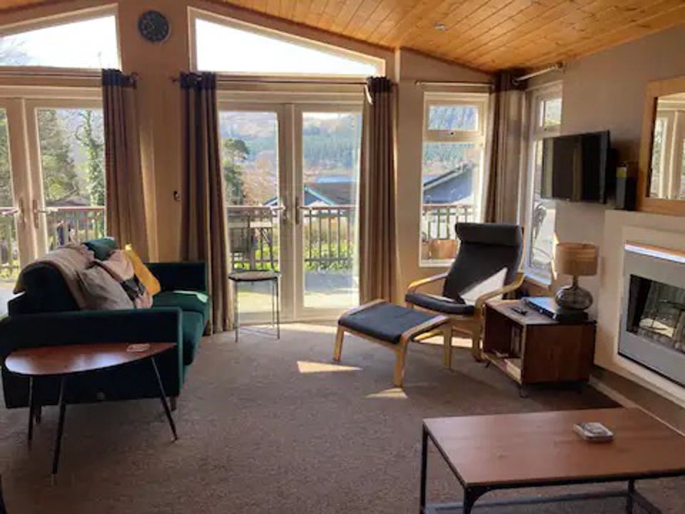 Lounge with fire and lake view