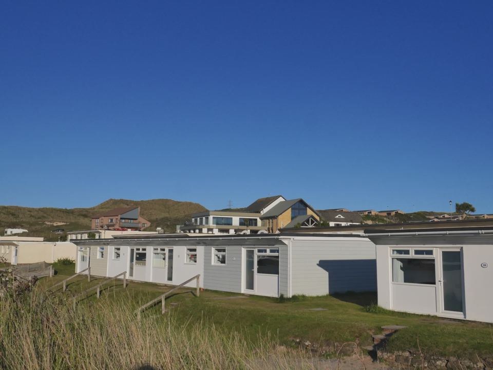 Row of lodges in the dunes