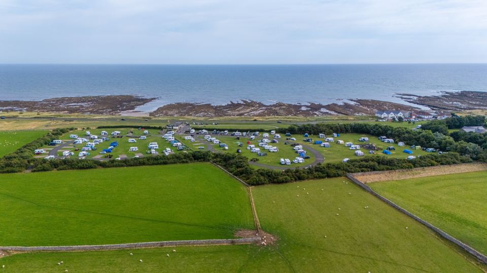 Site from above, sea beyond