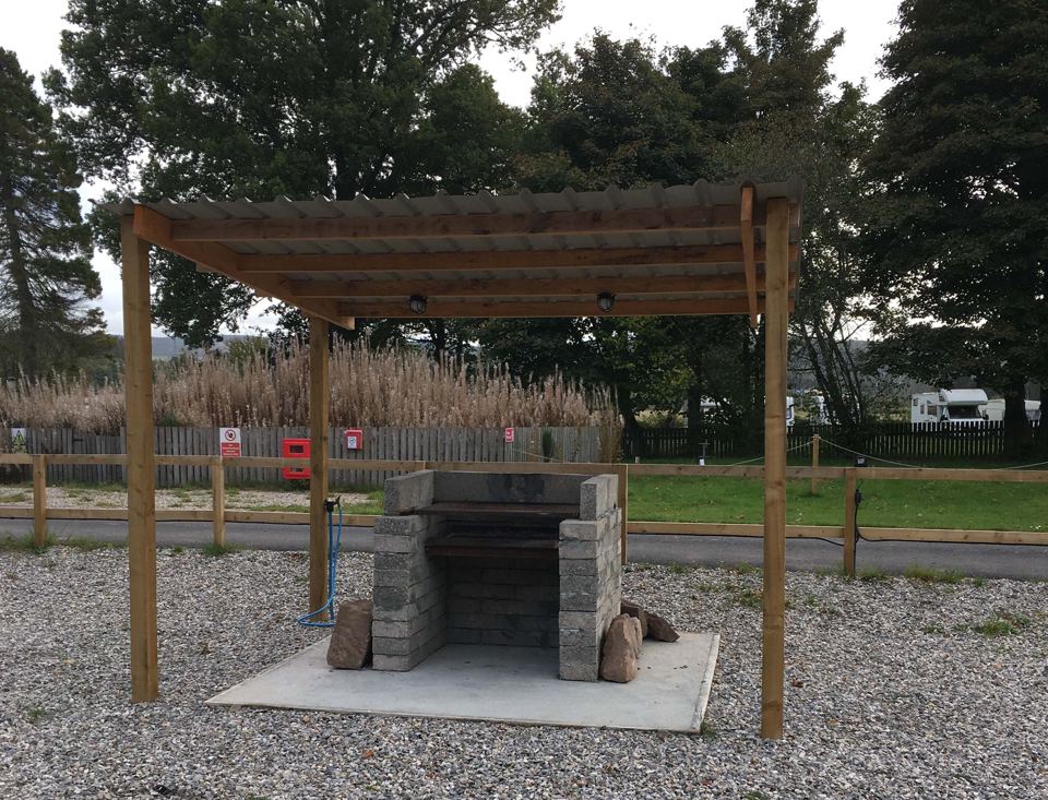 Communal barbecue pit