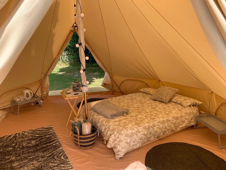 Inside a furnished bell tent
