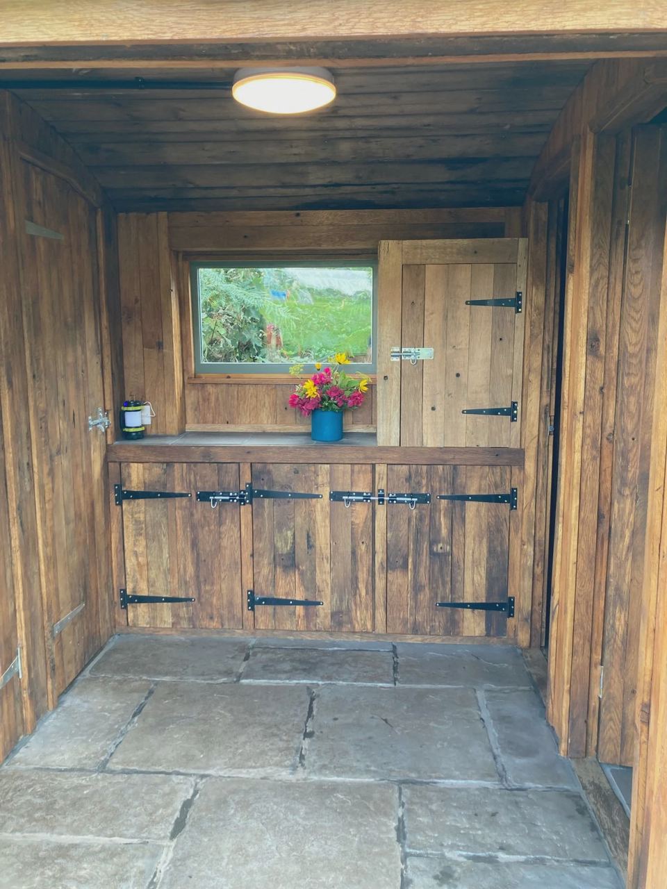 Inside a wooden room with window
