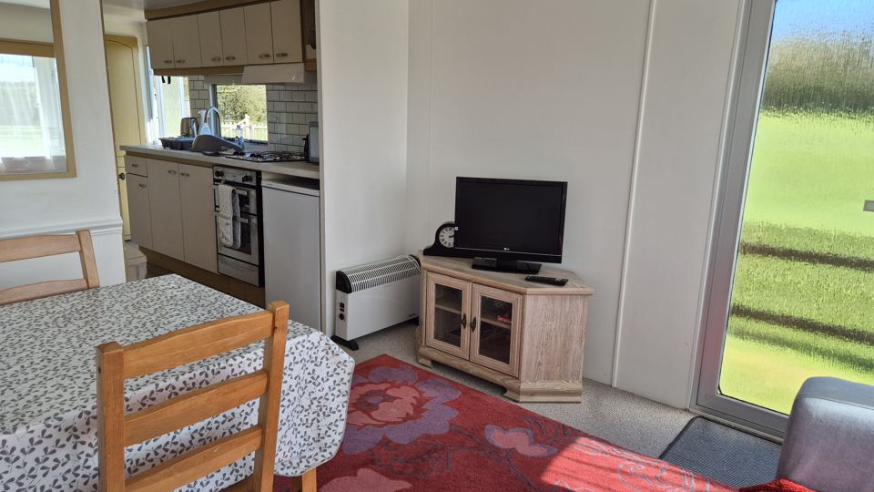 Static caravan lounge and kitchen