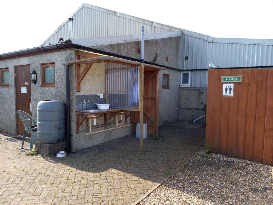 Toilet block and washing-up area