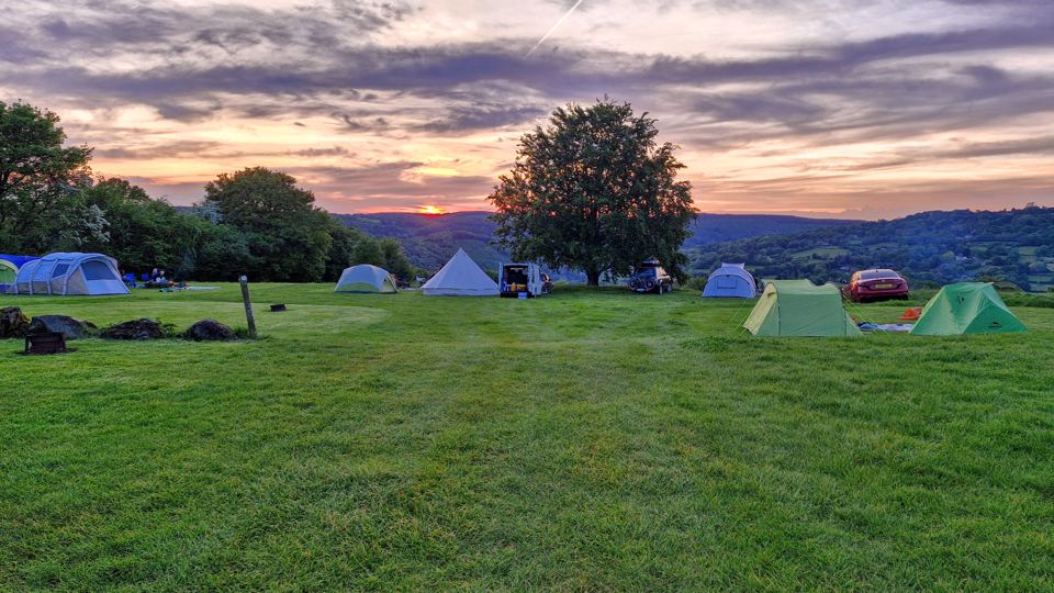 Tents at sunset over the valley