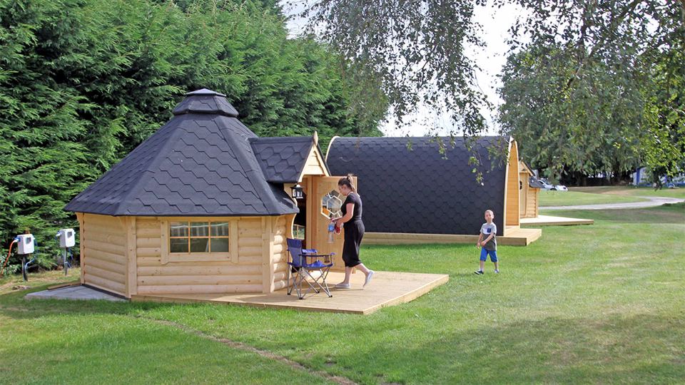 Glamping huts on the lawn