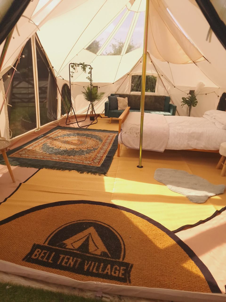 Inside a furnished bell tent