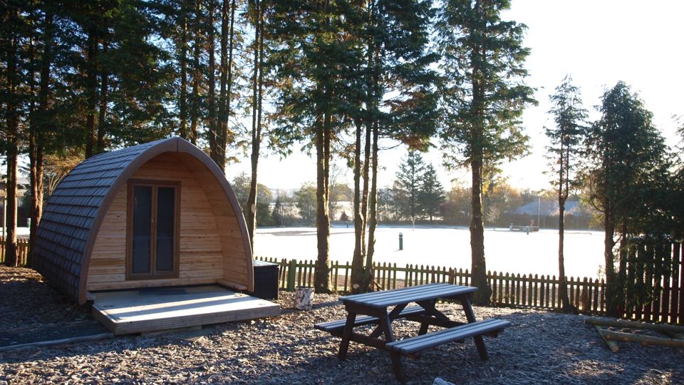 Camping pod with picnic bench