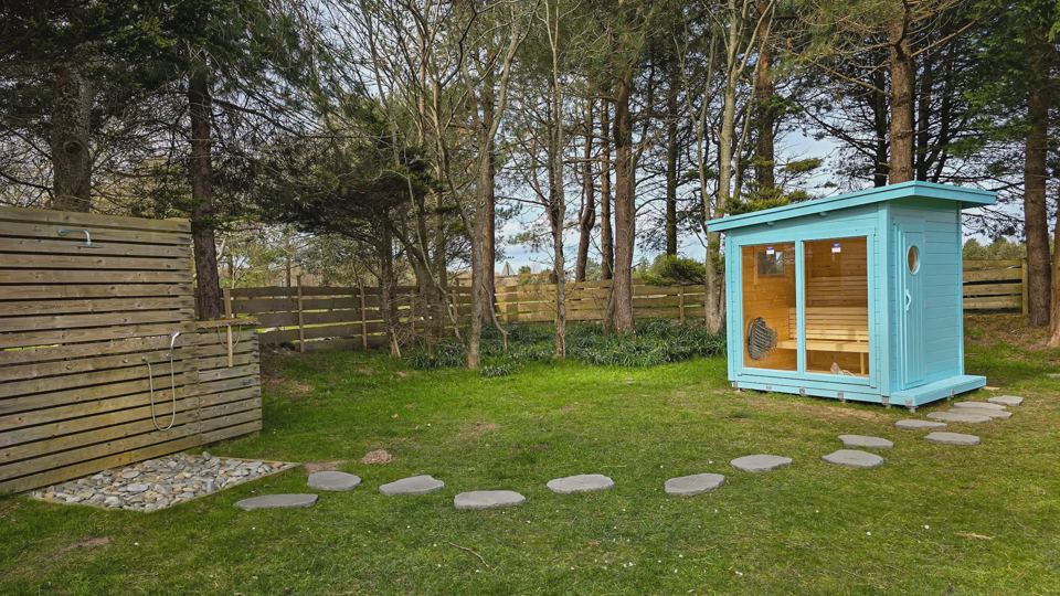 Sauna cabin under the trees