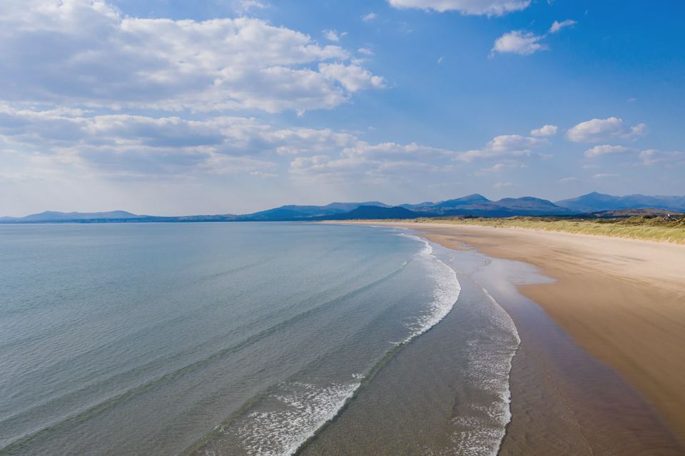 Sandy beach and the Rhinog hills