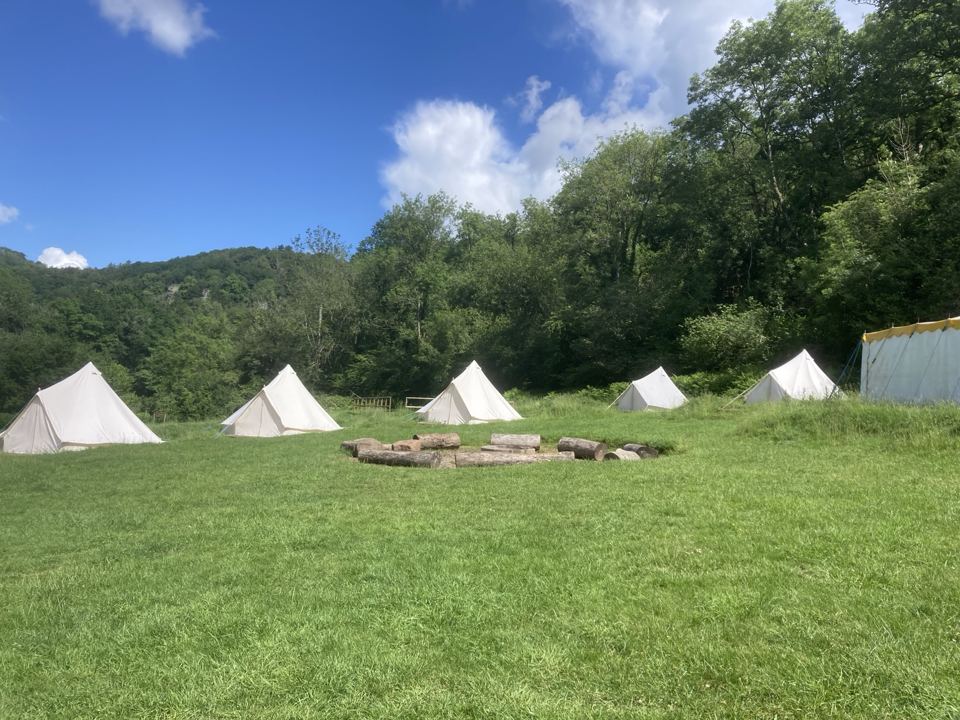 Tipi tents by the fire circle