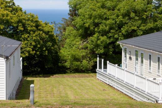 Static caravan with sea glimpse