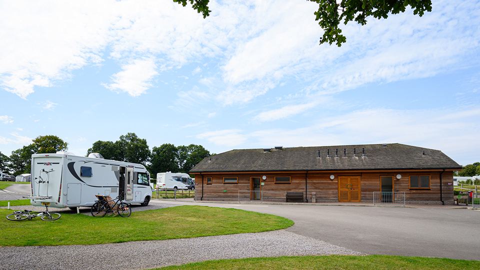 Motorhome beside the site building