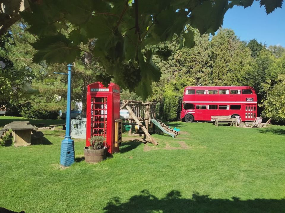 Play area and red bus