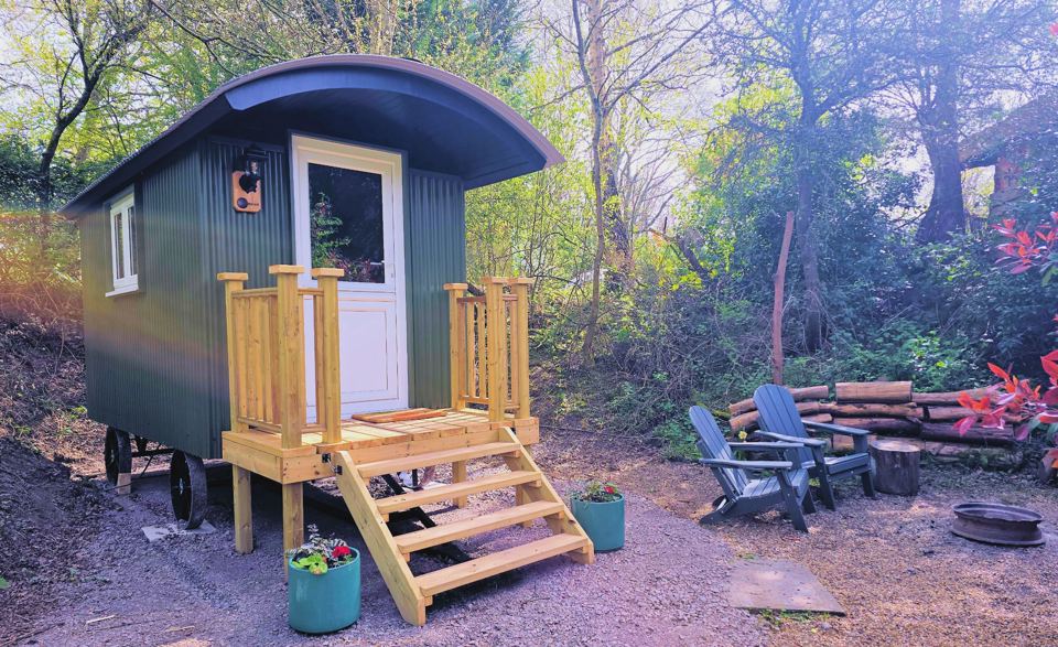 Shepherd's hut with fire pit