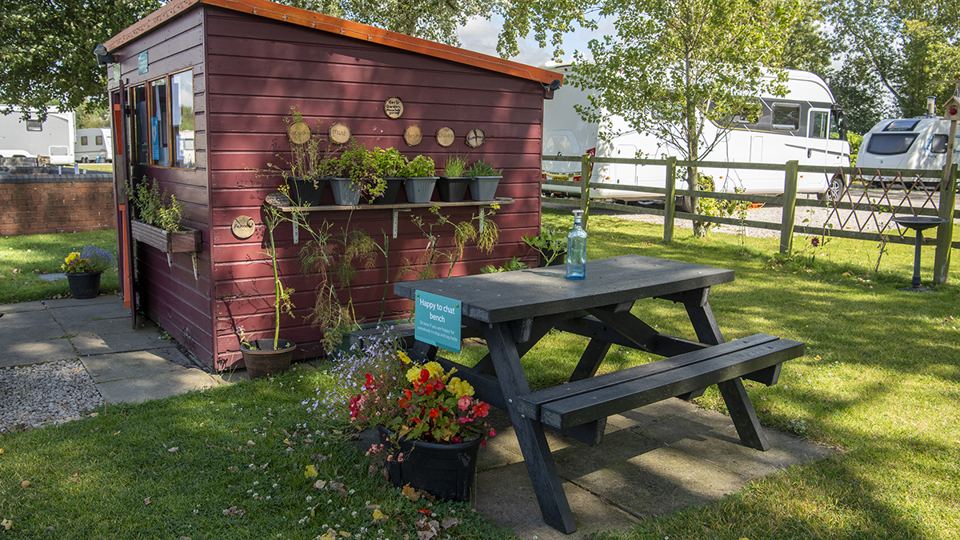 Garden shed and picnic bench