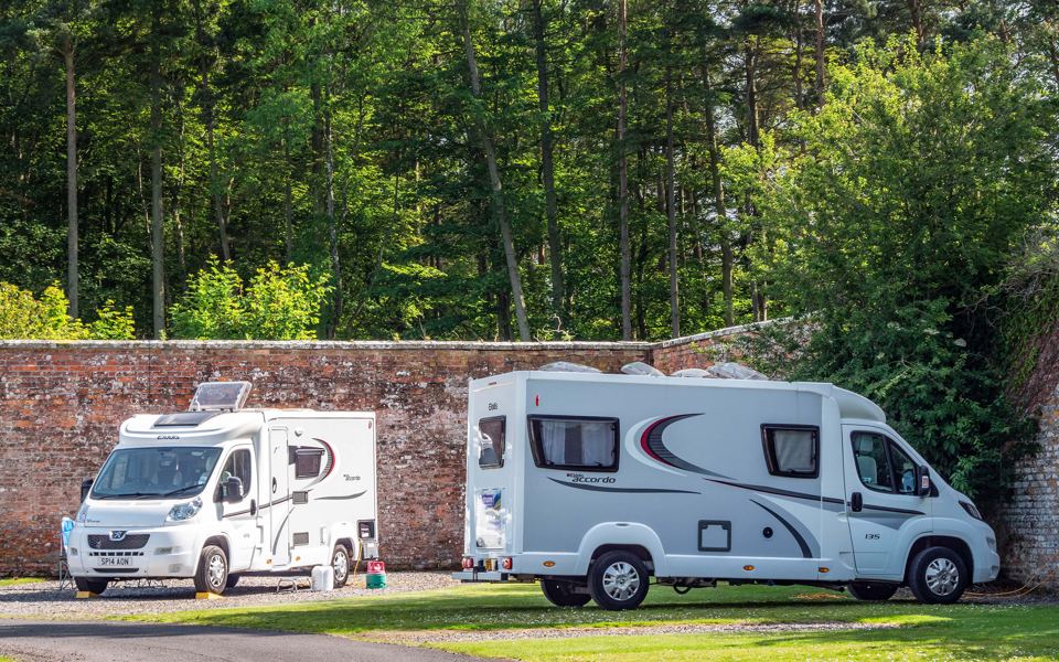 Motorhomes against the old wall